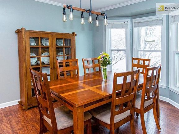 Farmhouse Dining Room with plenty of natural light. Did I mention newer thermal windows throughout??!