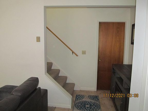 Living Rm, & Door to lower level bedroom--Viewed from front door.