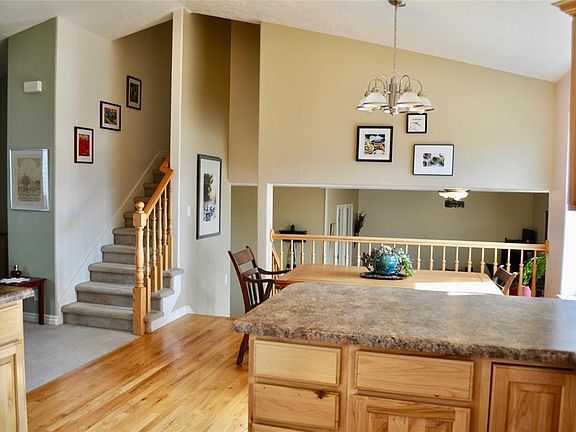 From Kitchen Looking Towards Dining Area and Family Room Downstairs
