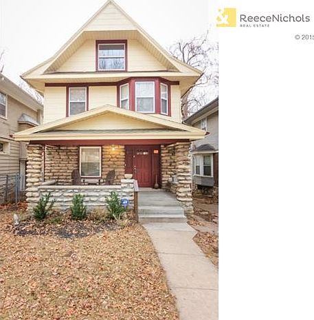Charming top to bottom remodel 3 story with inviting front porch