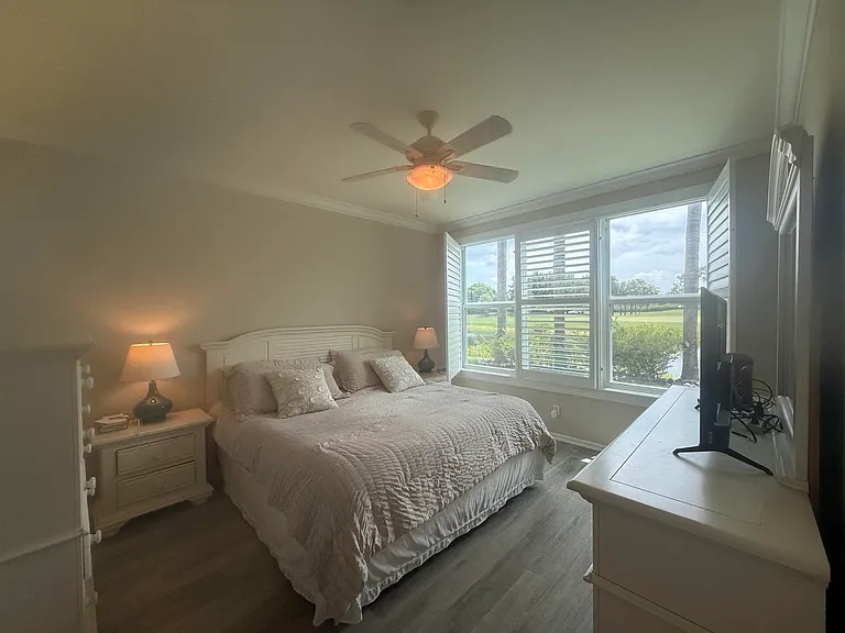 Master bedroom, king bed chest and dresser; great eastern view