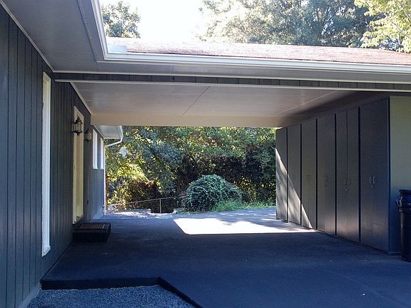 Carport with six storage lockers