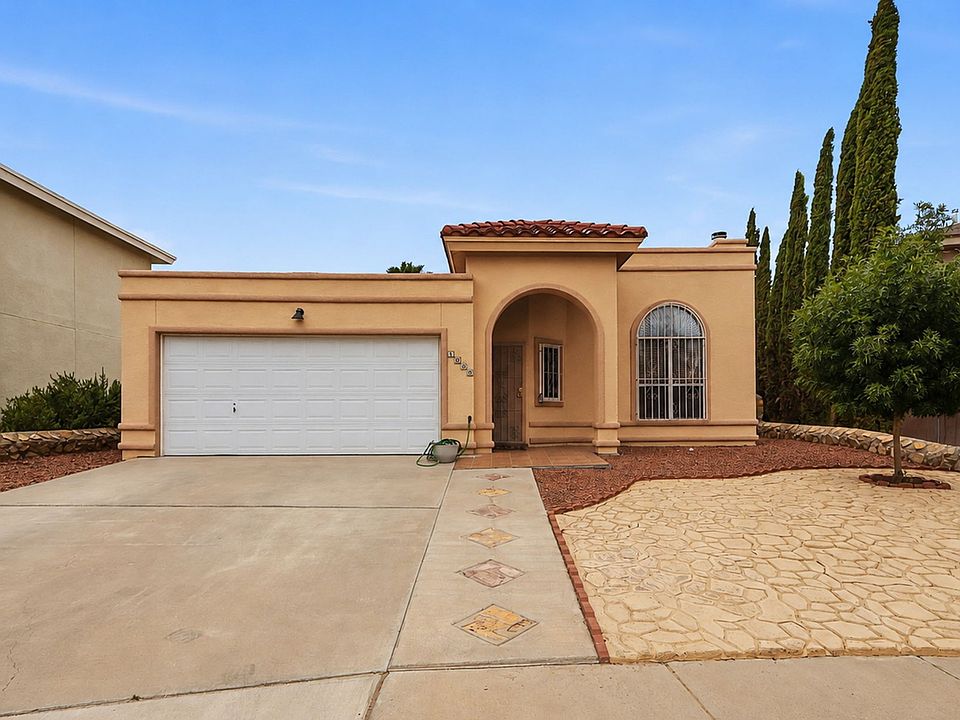 Front of the Home, 2-car manual garage door, xeriscape easy maintenance