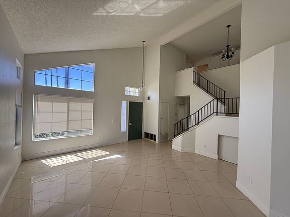 Alternate view of entry, living, and dinning area.