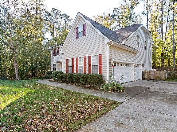 3 car garage w/ flat drive