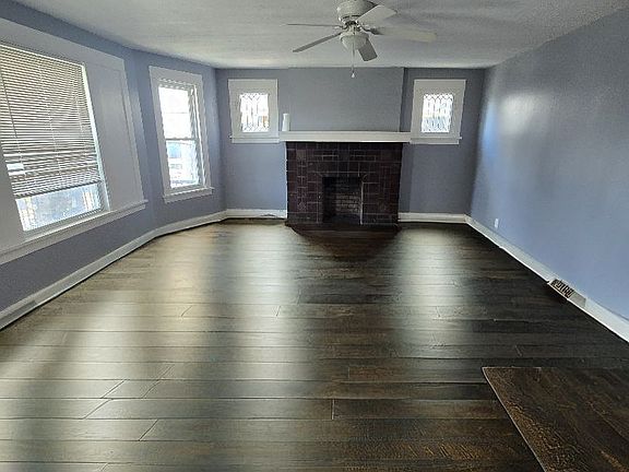 Spacious living room with bonus area for office space