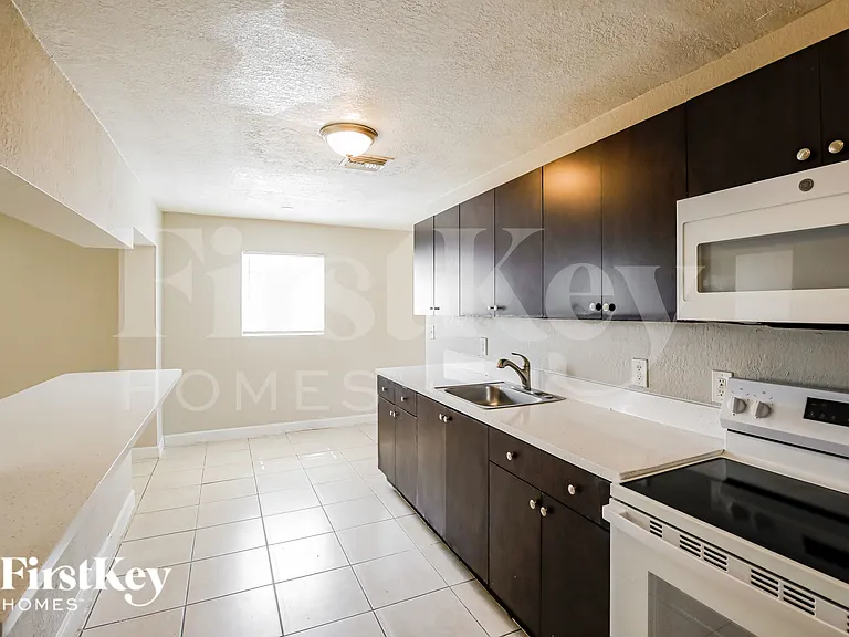 5980 NW 24th Ct — Photo 8