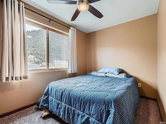The second of the two bedrooms. This is the least expensive of the two rooms renting for $1,100 a month . It is also not furnished like this. This is from The Last Tenant. The room will have a bed and a dresser and a nightstand.