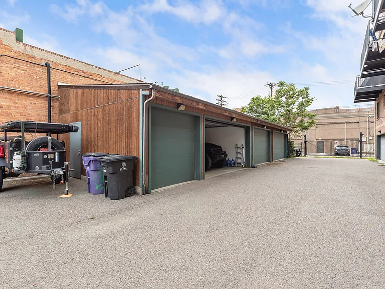 3 car garage with 1 additional slab parking spot.