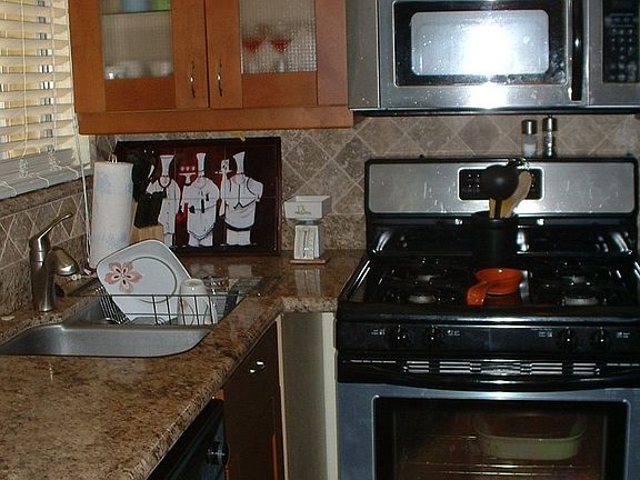 Modern KITCHEN with stainless steel appliances