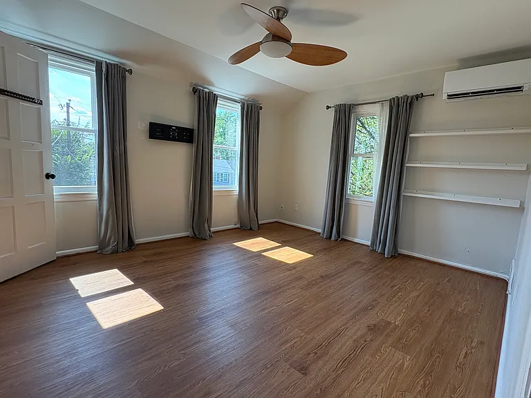 Light filled Primary bedroom with new A/C Mitsubishi mini splits