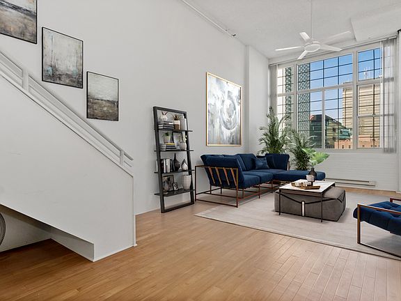 Your home has an open floorplan with large windows for natural light