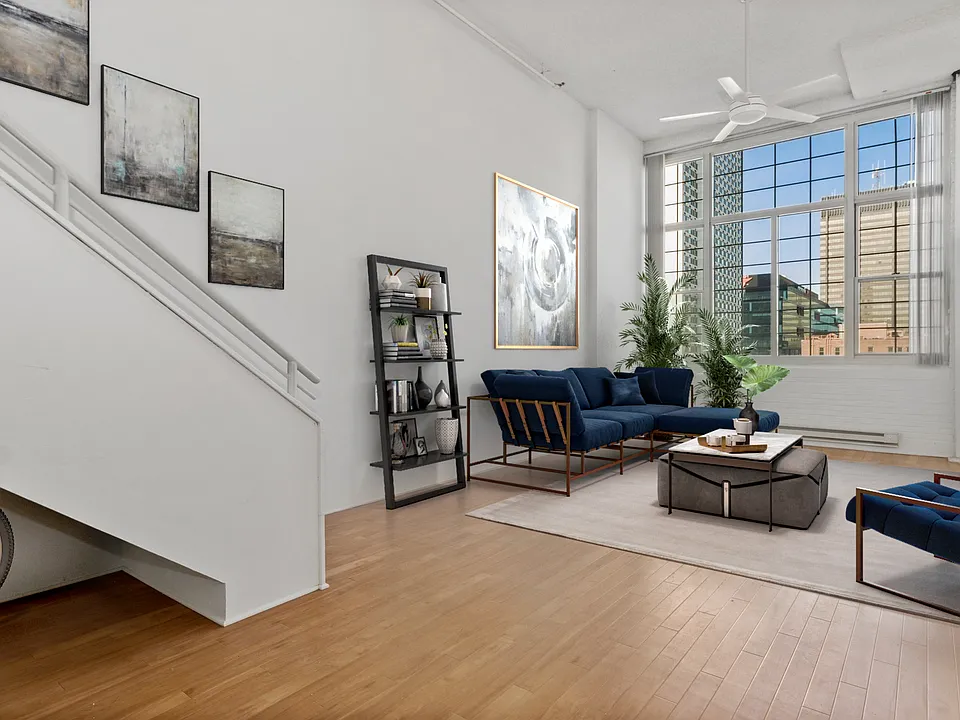 Your home has an open floorplan with large windows for natural light