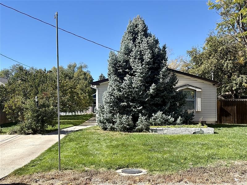 Front and side yard. Two parking spaces.