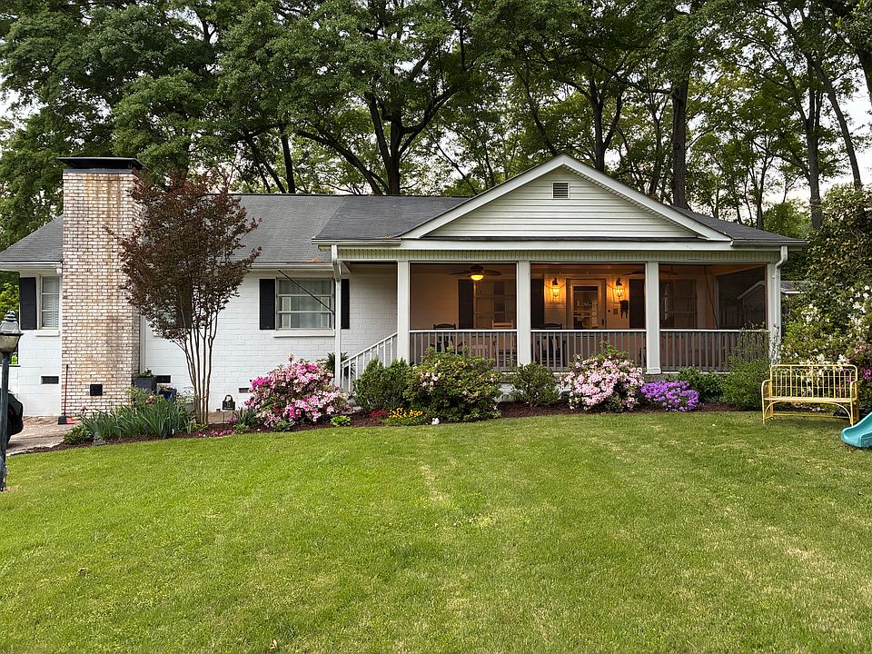 Screened in porch with porch swing