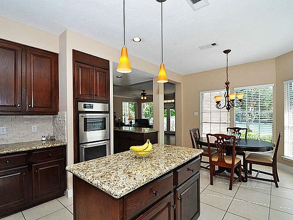 Super updated Kitchen with freshly Stained cabinets with new hardware throughout kitchen