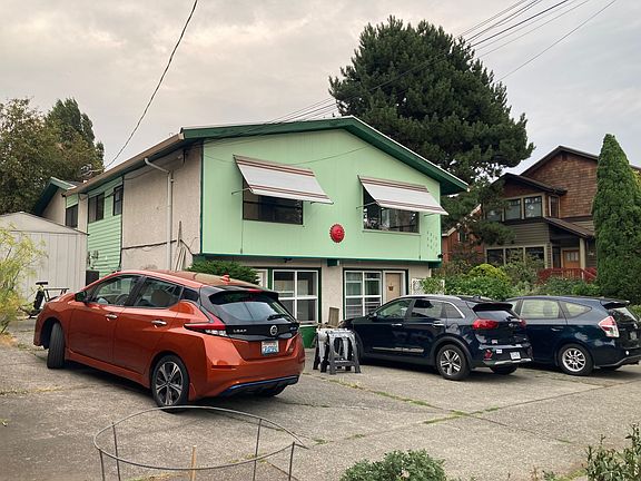 Exterior view, including off-street parking. Of street parking is available for unit car for unit 6014. Street parking is always available for additional cars. Unit 6014 is the top unit facing the front.