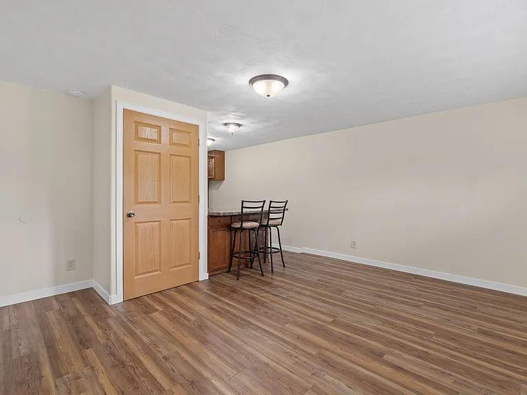 Comfortable living area with flexible layout and convenient closet