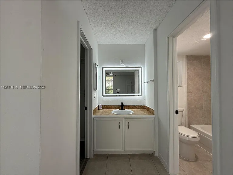 9440 Live Oak Pl #102 — Photo 14