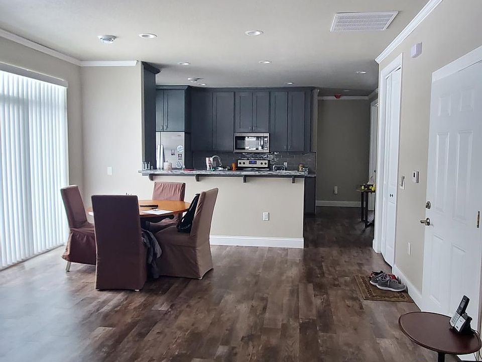 Ceiling fans, high ceilings, contemporary feel