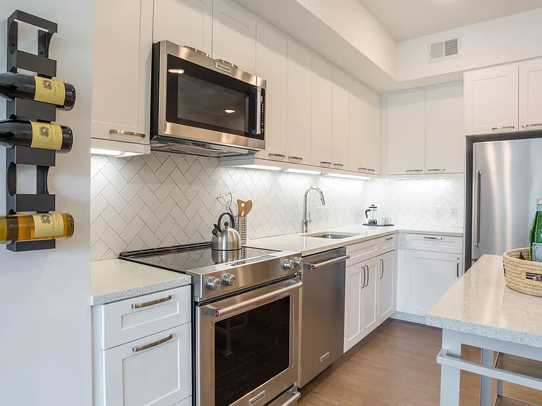 Kitchen with Stainless Steel Appliances and Quartz Countertops