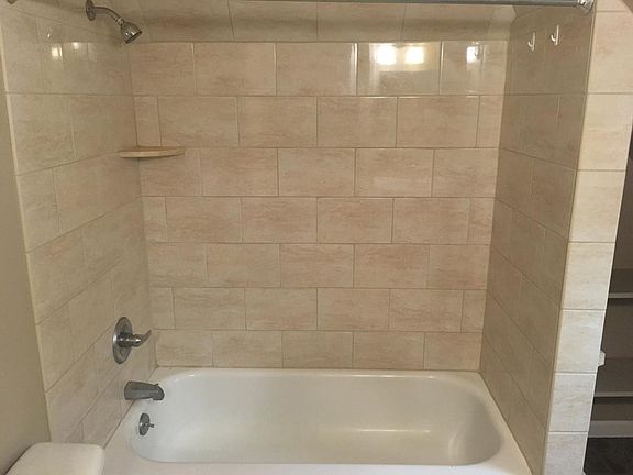 Tile tub surround.