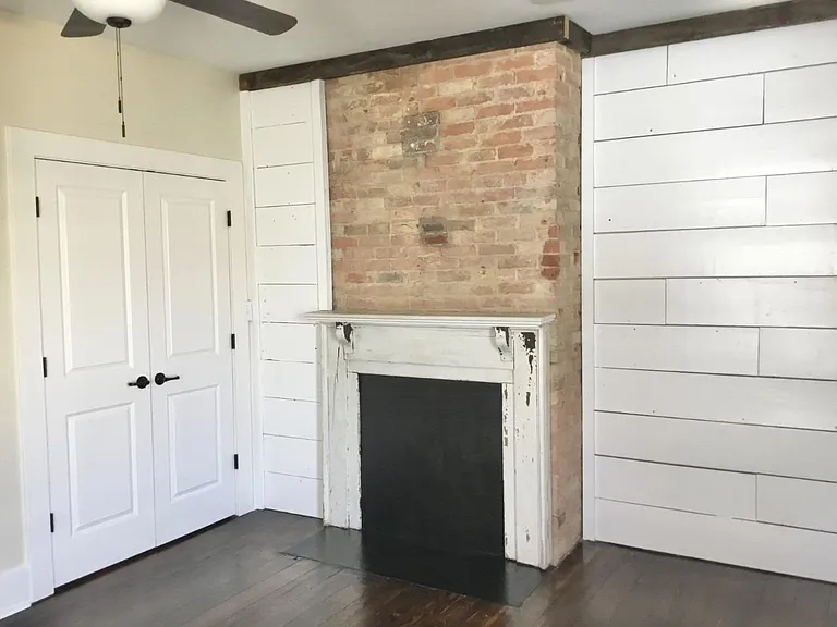 Front bedroom non-operational fireplace and large closet