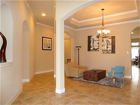 ENTRY/DAN- This spacious room is versatile.Just use your imagination.