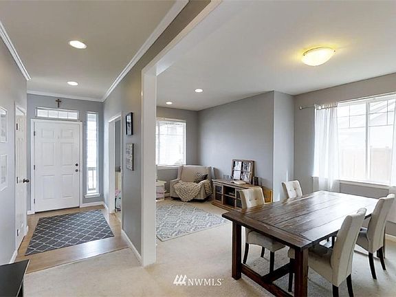 Dining room
Living room
Entryway
*Updated with hard surface flooring throughout
*Updated with dining room pendant light
*Updated with cellular blinds