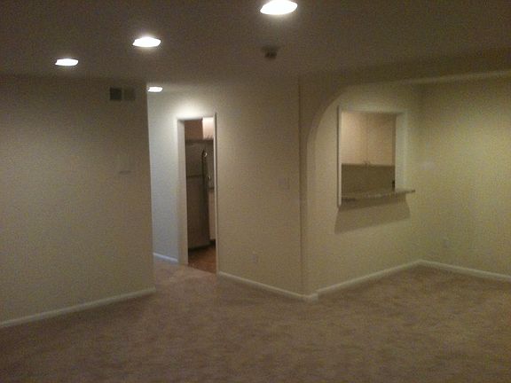 Living room left side and dining area on right