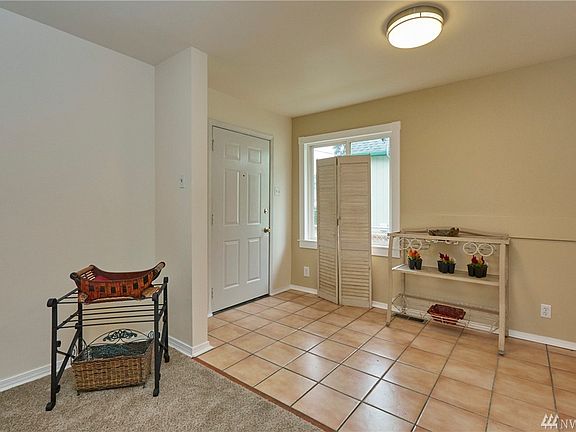 Spacious Entry has tile floor and entry closet