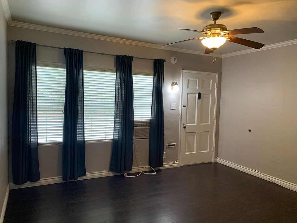 Living Room, front door, window A/C unit
