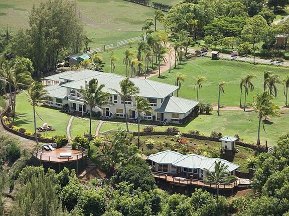 Private gated 3 acre compound