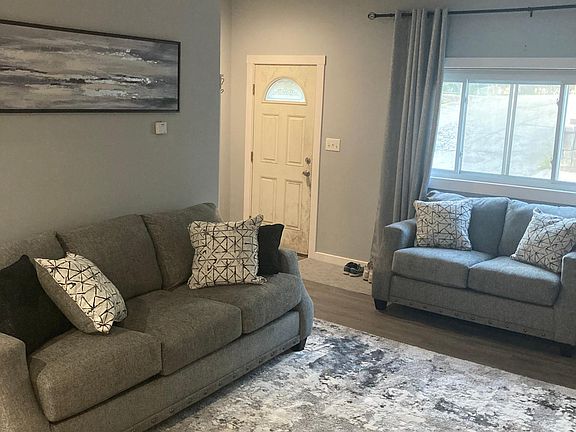 Sofas and area rug included