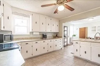 Photo 8. Kitchen with ample cabinet space