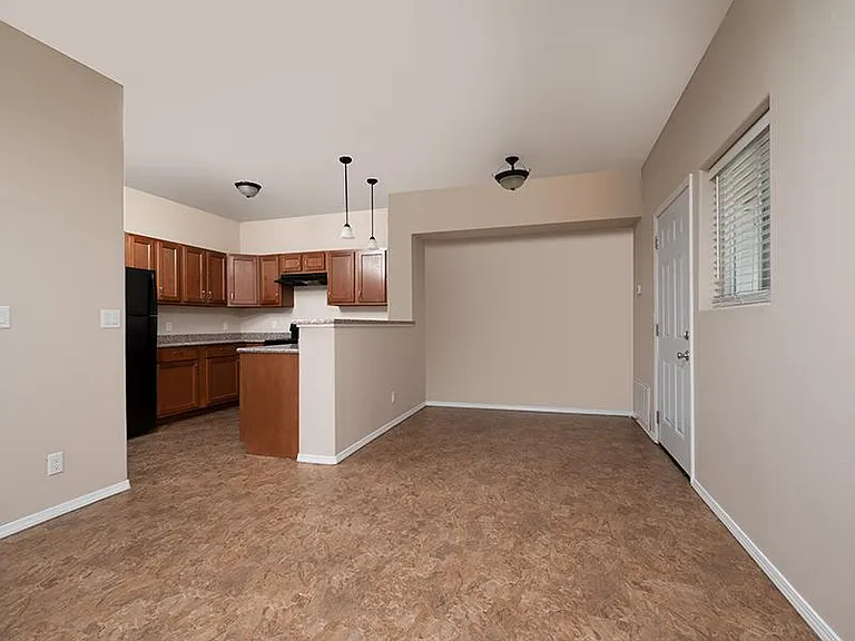 Living Room and Dining Room|2-Bedroom 1-Bathroom Apartment Homes | Coronado Townhomes