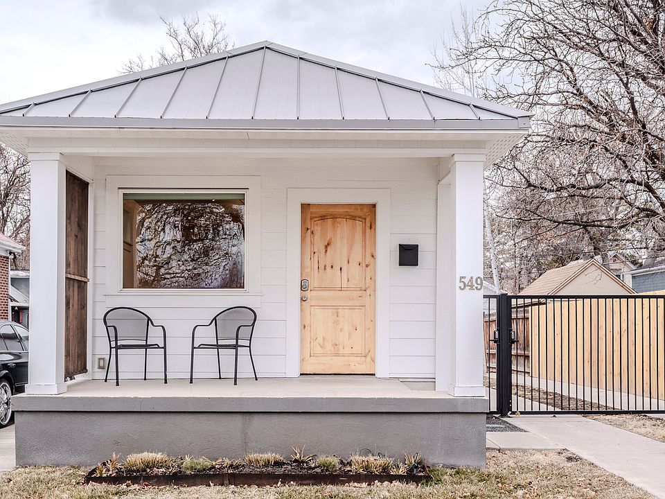 Secure yard, durable metal roof, and the perfect porch for sipping coffee.