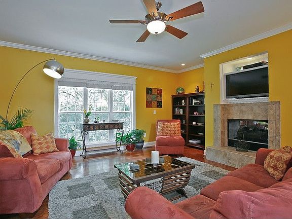 Raised hearth fireplace-niche for large screen tv