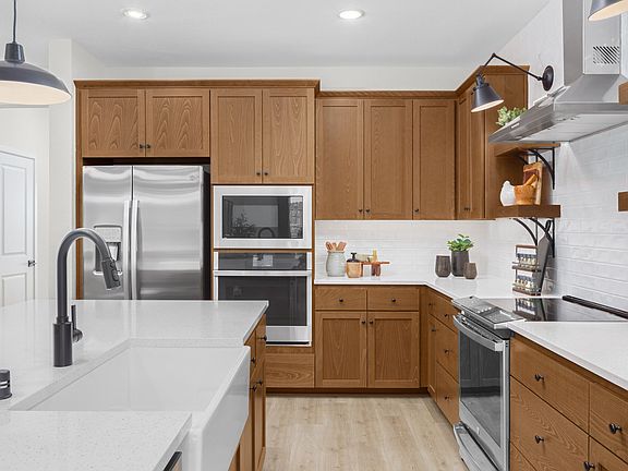 Kitchen with white apron-front sink