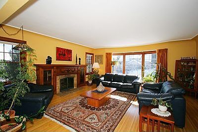 Party-sized formal living room with beautiful leaded bay window