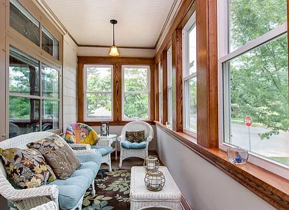 3 Season porch with all new woodwork to match the interior of the home, also new windows on the porc