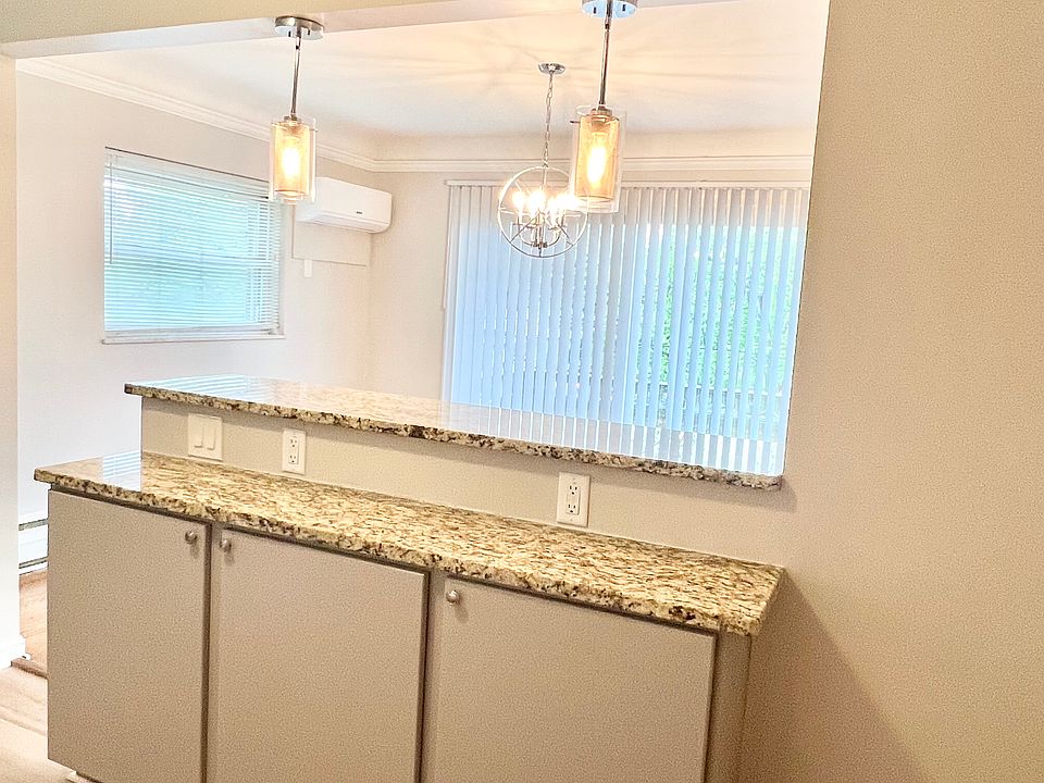 Extra cabinet and countertop space with patio view.