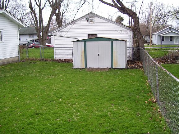 Storage Shed behind garage