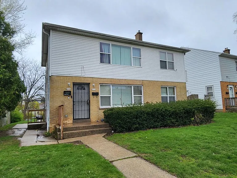 8109-8111 W Villard Ave. (Duplex) — Photo 1