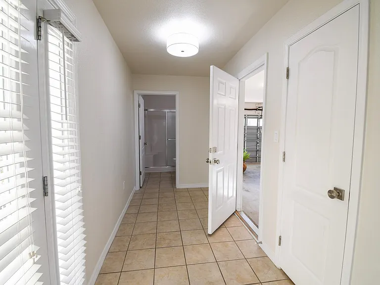 Foyer leading to double car garage