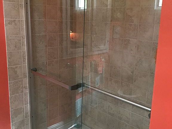 New, large walk in shower 