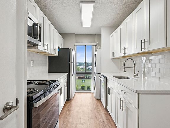 Your modern kitchen has large counter space and updated appliances