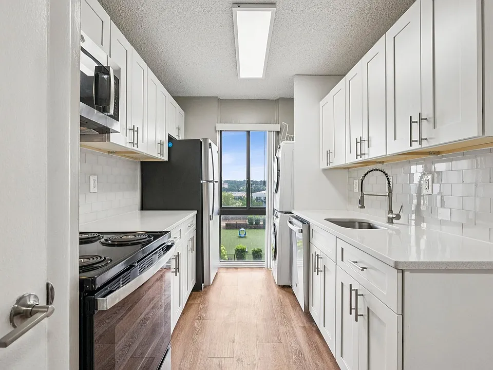 Your modern kitchen has large counter space and updated appliances