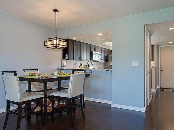 dining area with pass through to kitchen. Dining table and chairs are included.