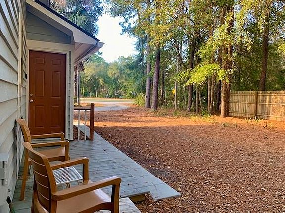 your private entry where you park and your private patio and side yard..